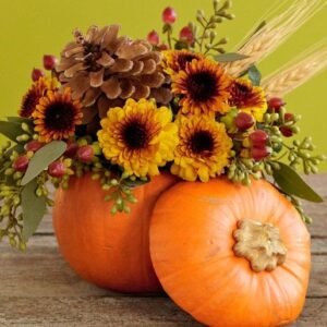 Decoración floral con calabaza para Halloween